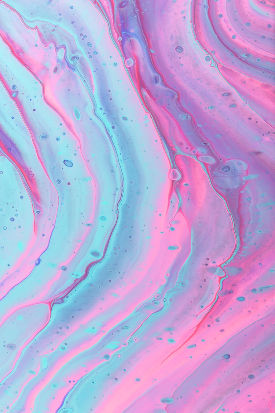 Liquid marble — colours mixing into a new form